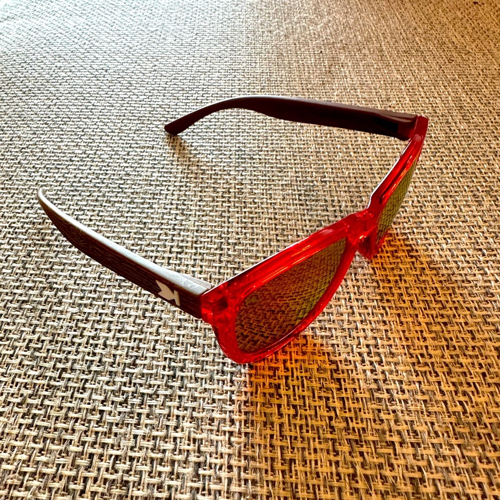 Knockaround “Premiums” brand kids sunglasses. Faux wood sides, red glossy front.